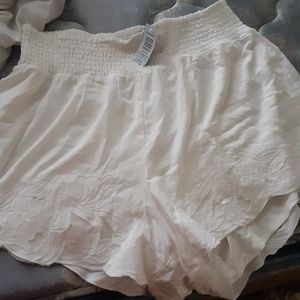 Torrid white flowy shorts
